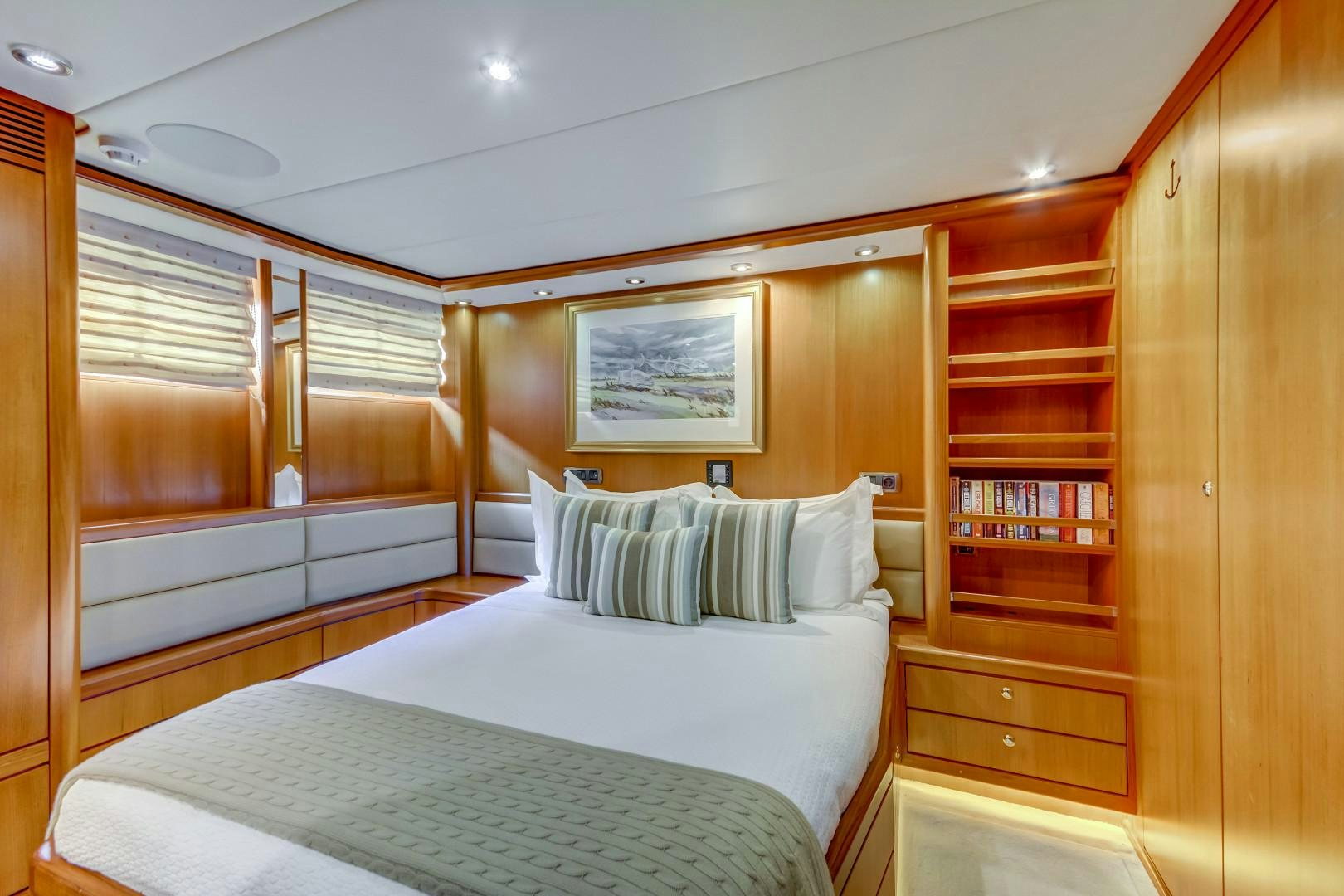 a room with two beds aboard GUSTO Yacht for Sale
