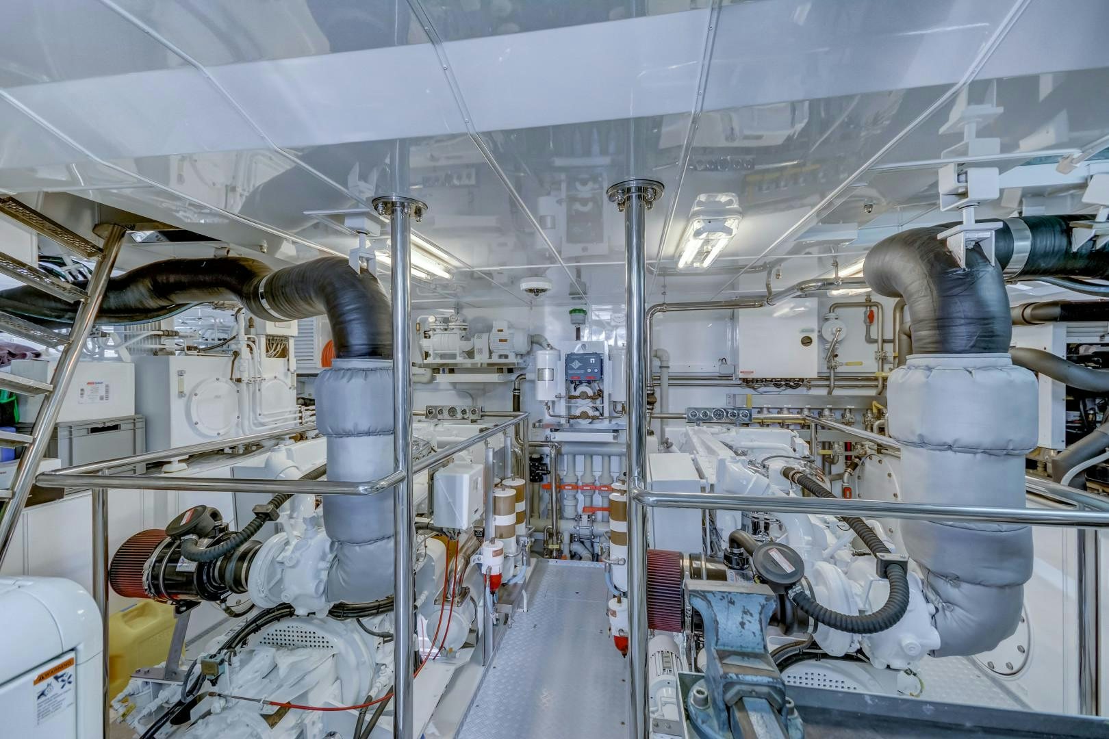 a room with pipes and tubes aboard GUSTO Yacht for Sale
