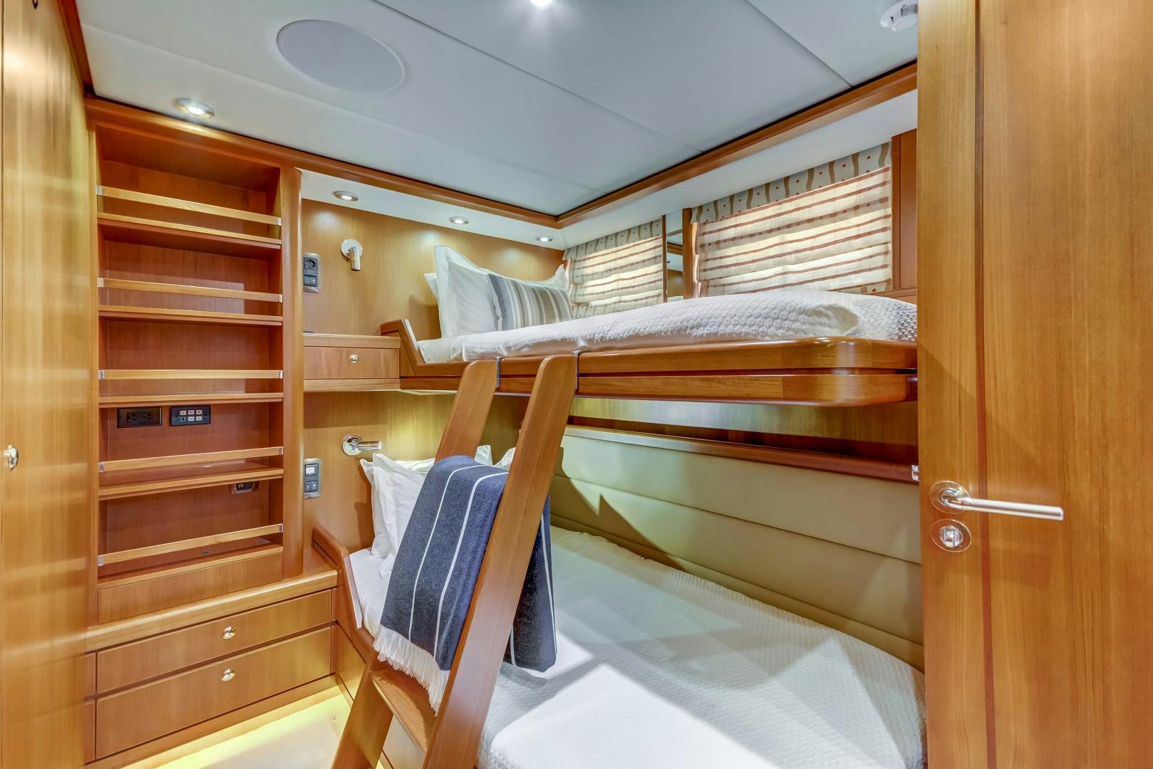 bunk beds in a room aboard GUSTO Yacht for Sale