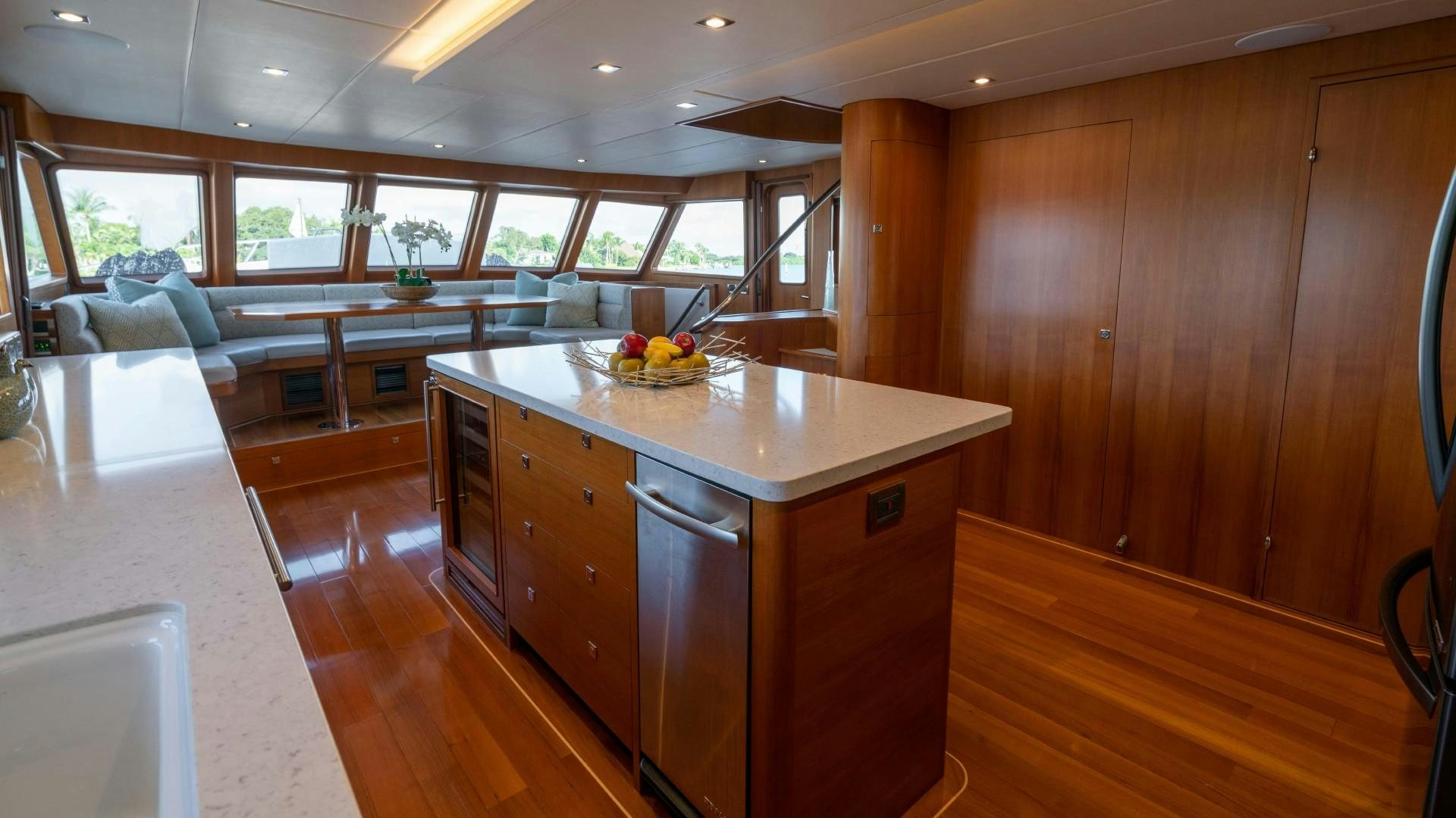 a kitchen with a large island aboard BLUE CHIP Yacht for Sale