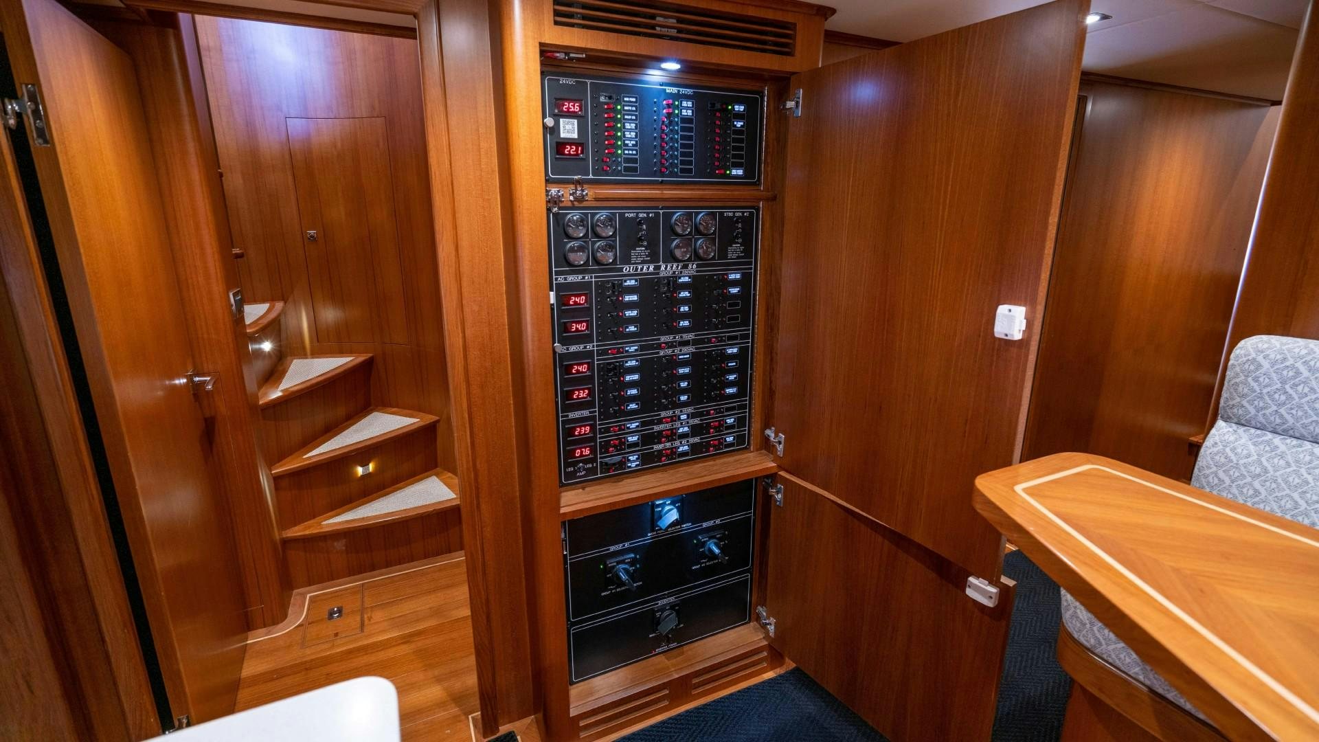 a black oven in a wooden kitchen aboard BLUE CHIP Yacht for Sale