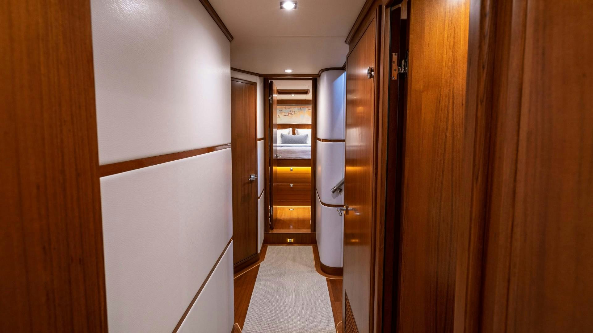 a hallway with doors aboard BLUE CHIP Yacht for Sale
