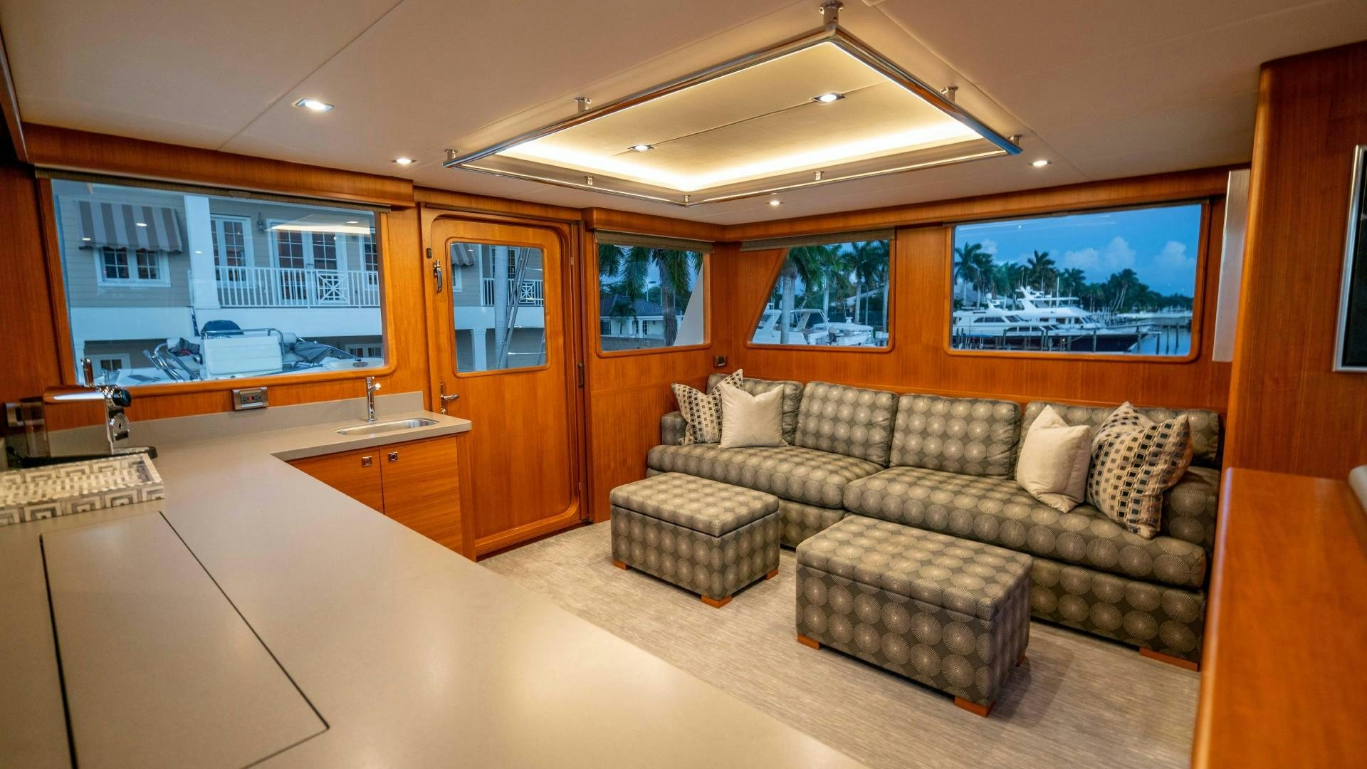 a living room with a couch and a coffee table aboard BLUE CHIP Yacht for Sale