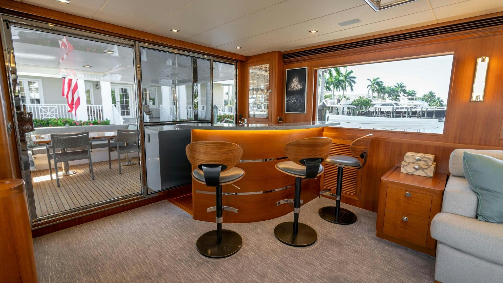 a living room with a couch and a table aboard BLUE CHIP Yacht for Sale