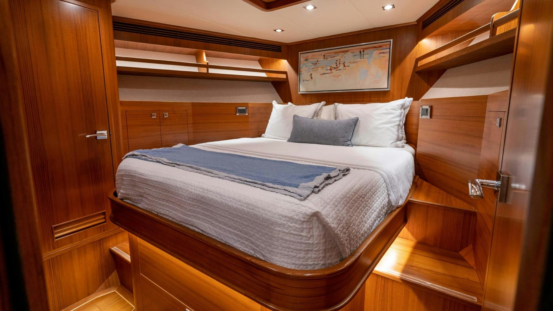 a bed in a room aboard BLUE CHIP Yacht for Sale