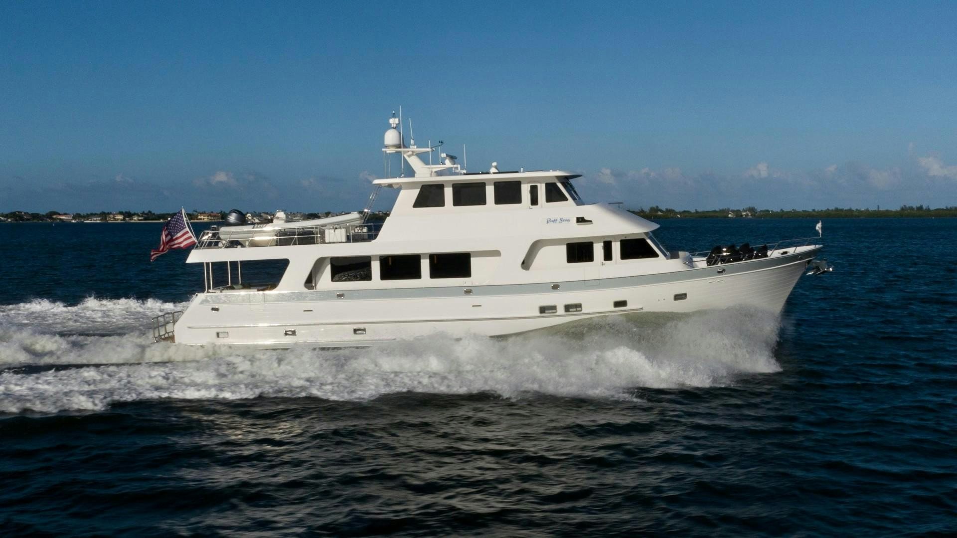 a boat on the water aboard BLUE CHIP Yacht for Sale