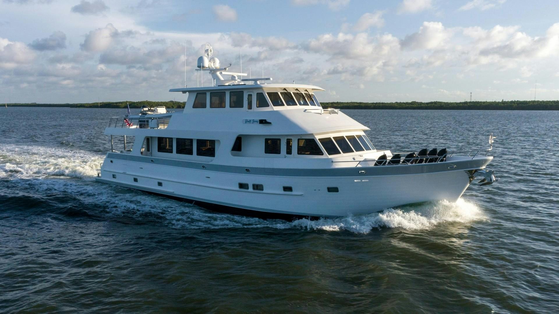 a boat on the water aboard BLUE CHIP Yacht for Sale