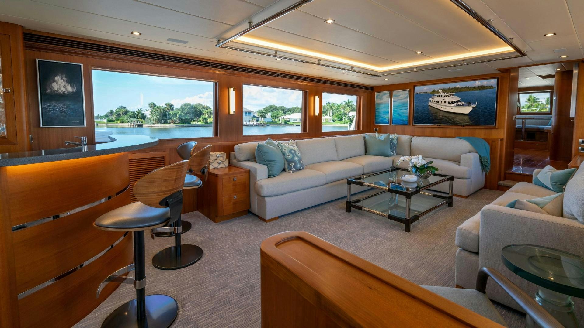 a living room with a couch and a coffee table aboard BLUE CHIP Yacht for Sale