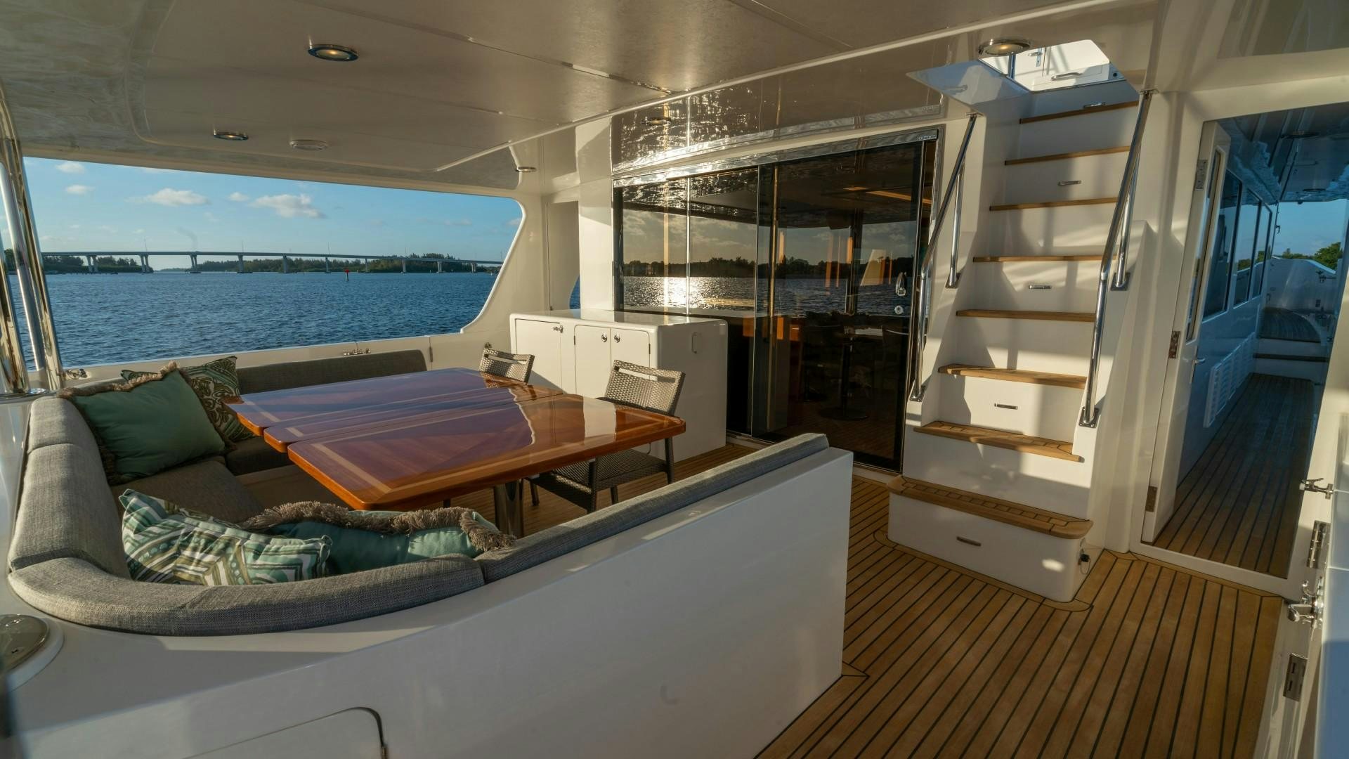 a room with a bed and a table aboard BLUE CHIP Yacht for Sale