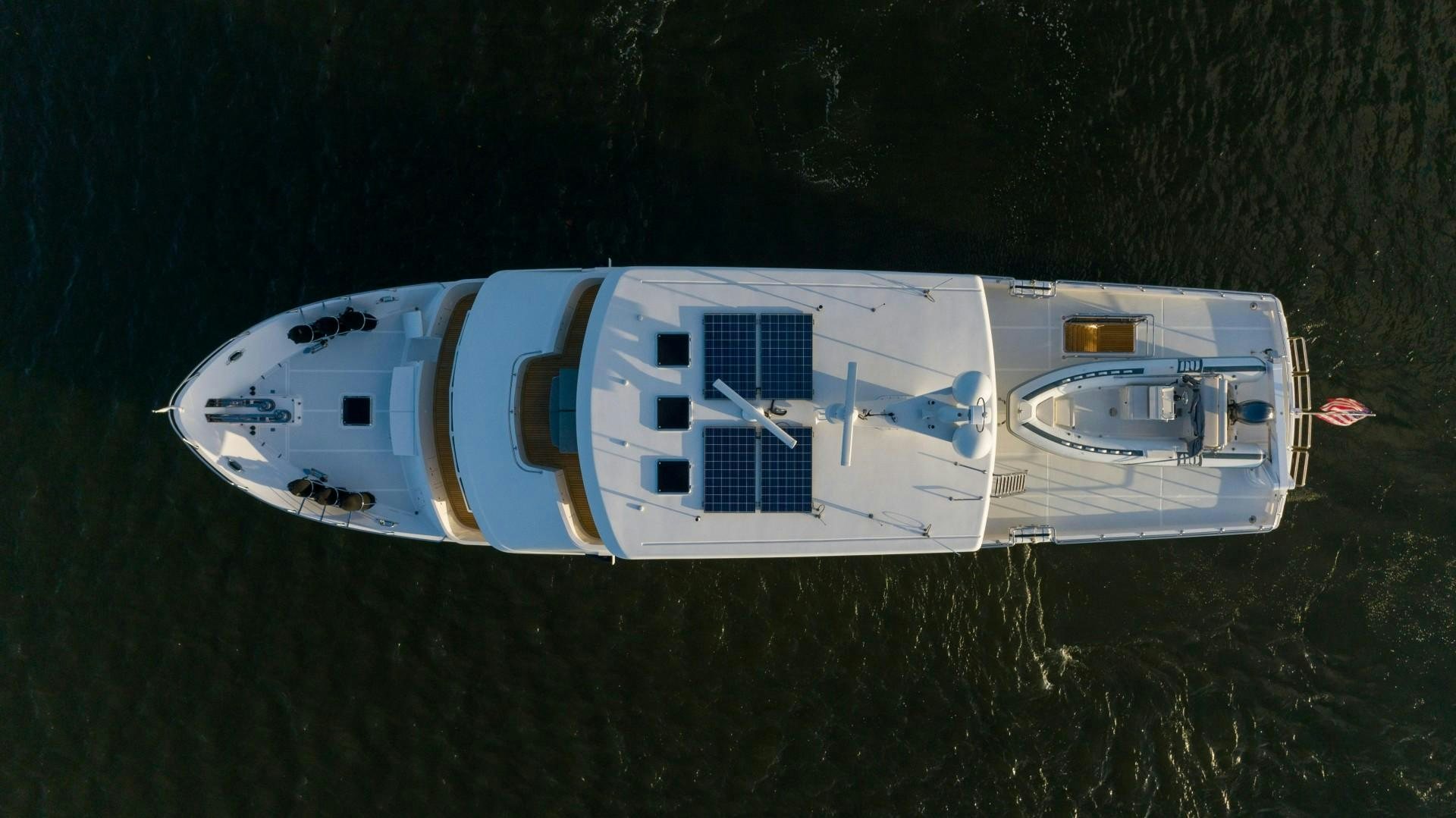 a white boat in the water aboard BLUE CHIP Yacht for Sale