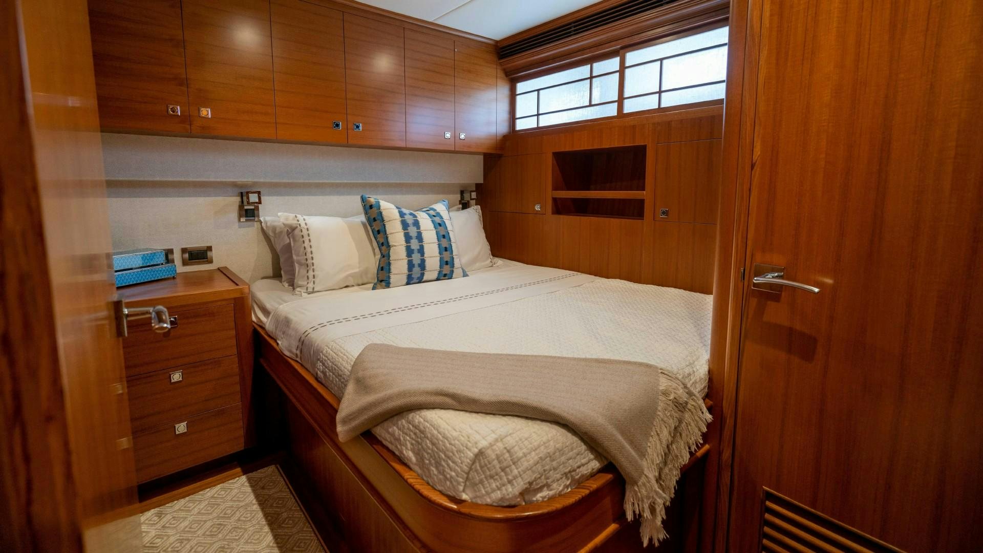 a room with two beds aboard BLUE CHIP Yacht for Sale