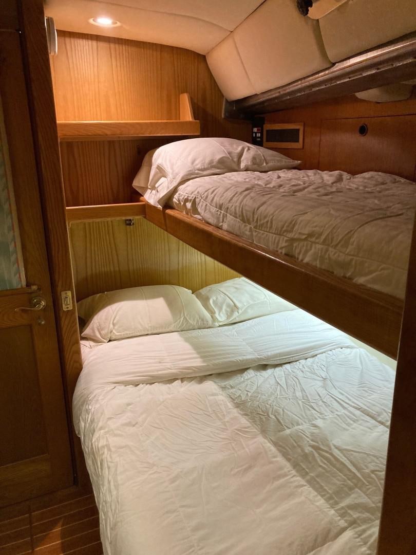 a room with bunk beds aboard DANCES WITH WOLVES Yacht for Sale