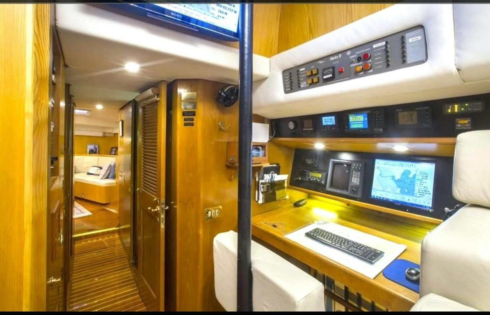 a room with computers and monitors aboard DANCES WITH WOLVES Yacht for Sale