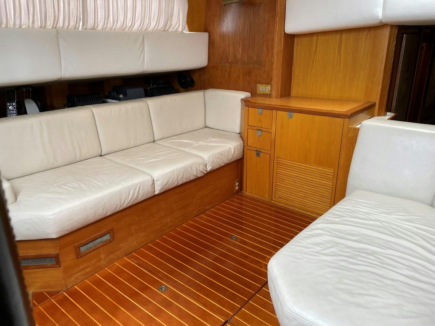 a room with a bed and a couch aboard DANCES WITH WOLVES Yacht for Sale