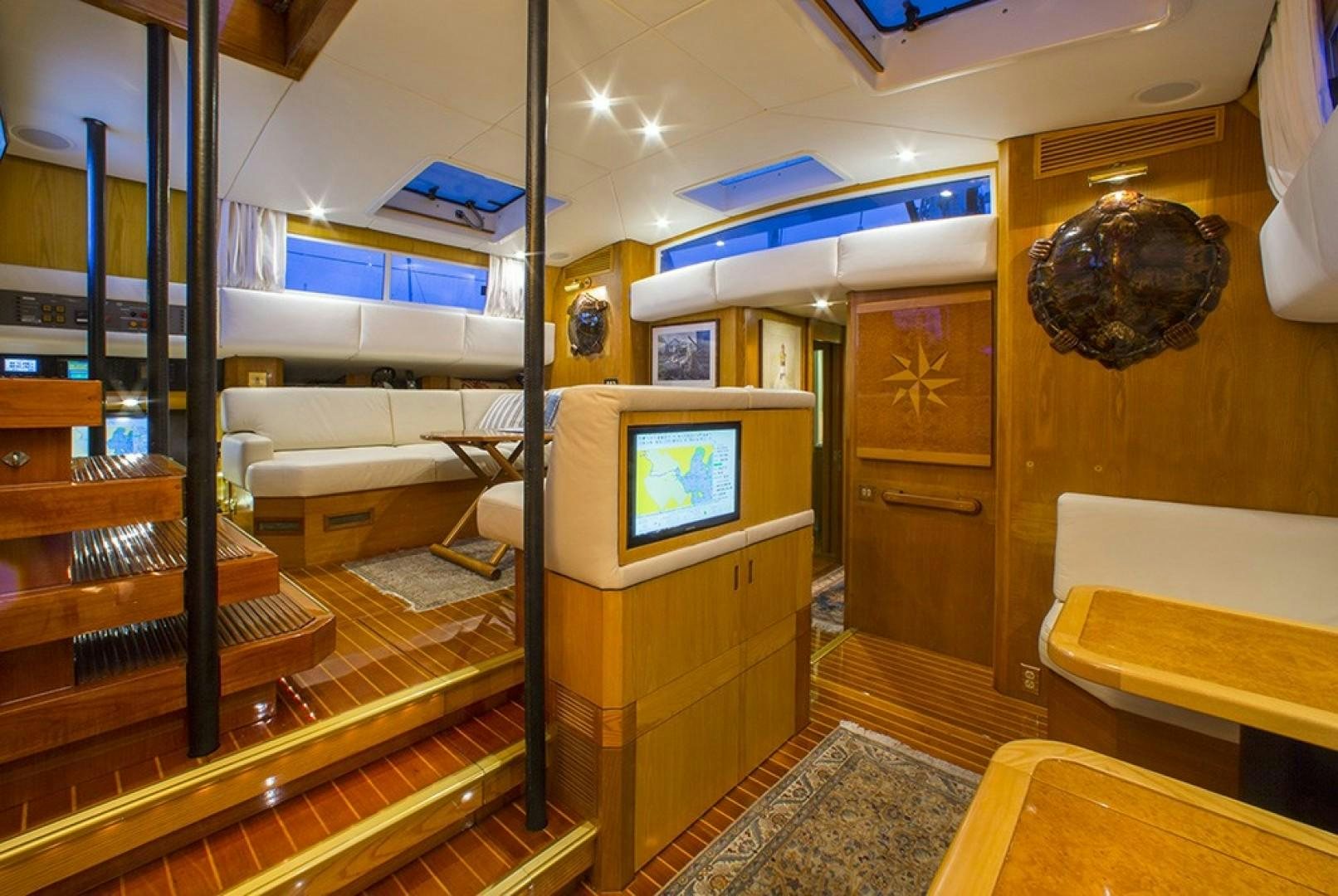 a room with bunk beds and a tv aboard DANCES WITH WOLVES Yacht for Sale