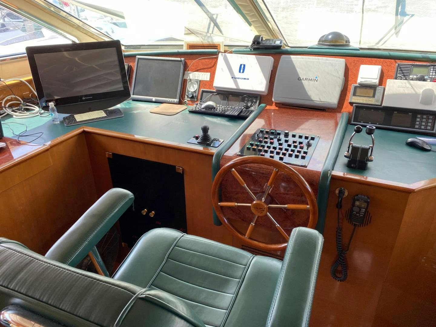 a desk with computers and other office supplies aboard ISLAND SEEKER Yacht for Sale