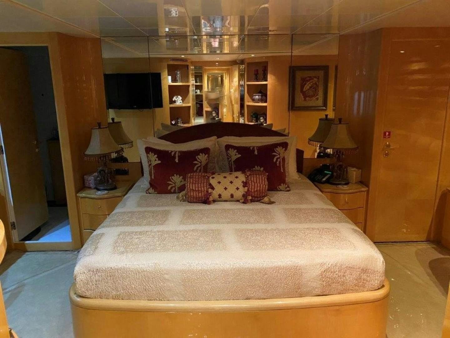 a large bed in a hotel room aboard ISLAND SEEKER Yacht for Sale