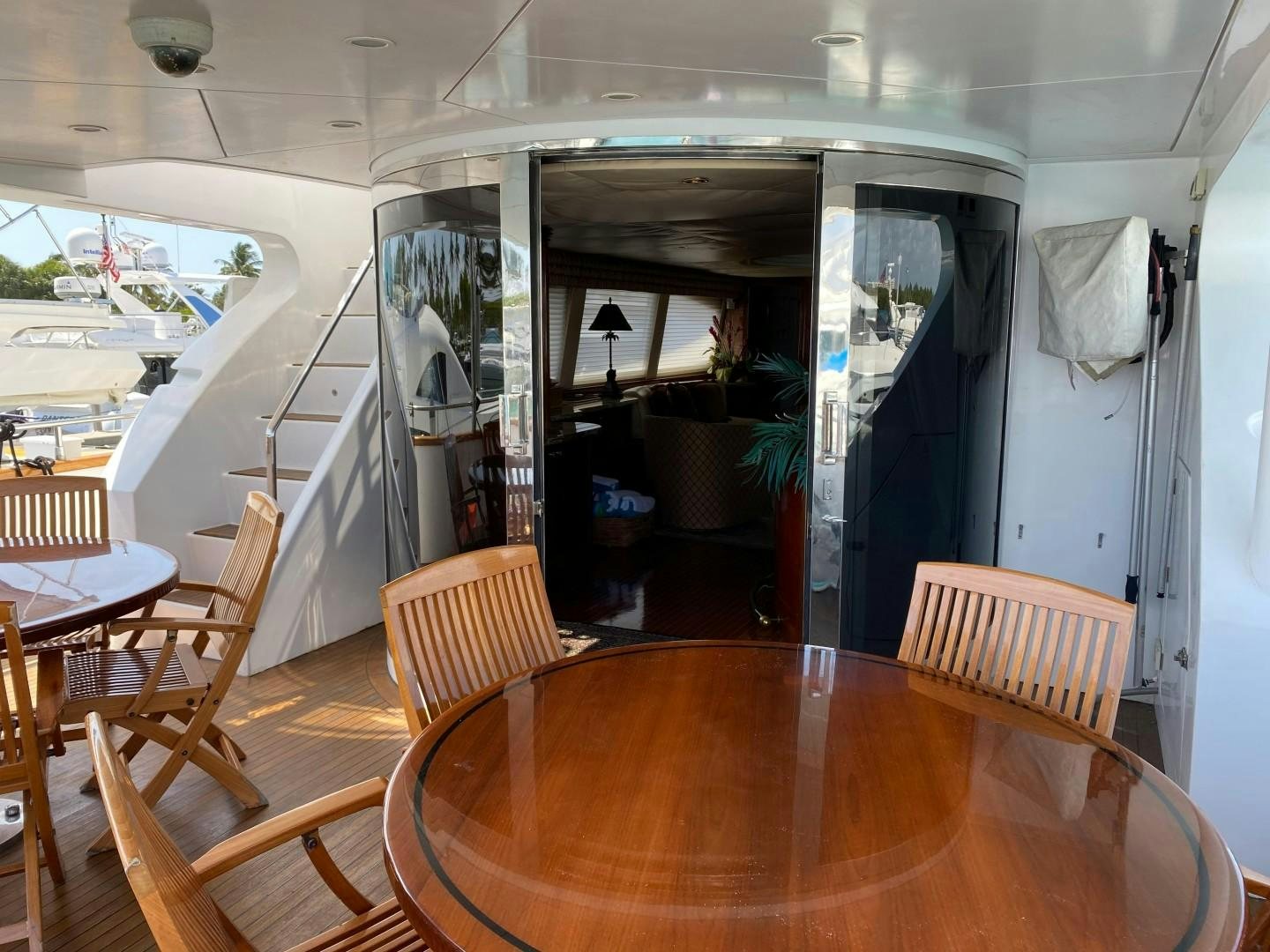 a room with tables and chairs aboard ISLAND SEEKER Yacht for Sale