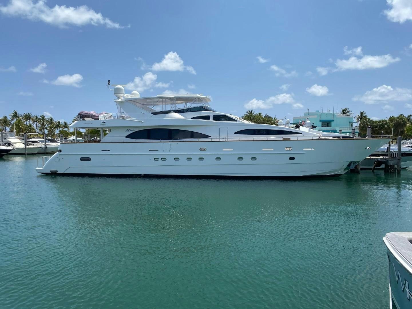 a white yacht in the water aboard ISLAND SEEKER Yacht for Sale