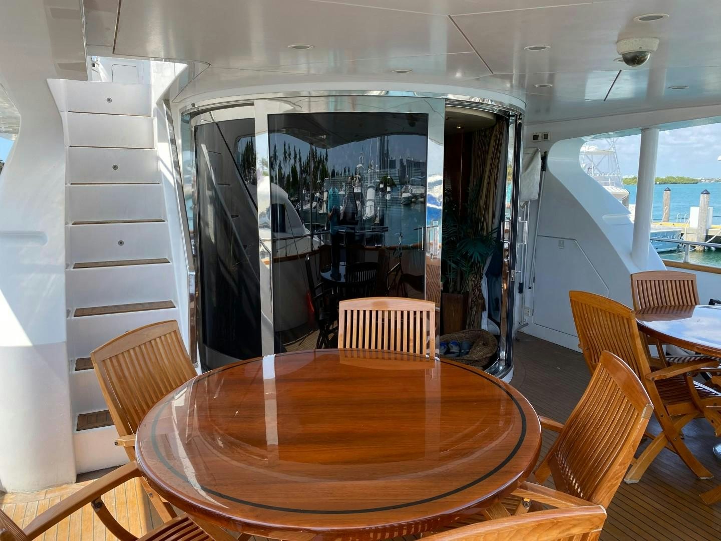 a room with a table and chairs aboard ISLAND SEEKER Yacht for Sale
