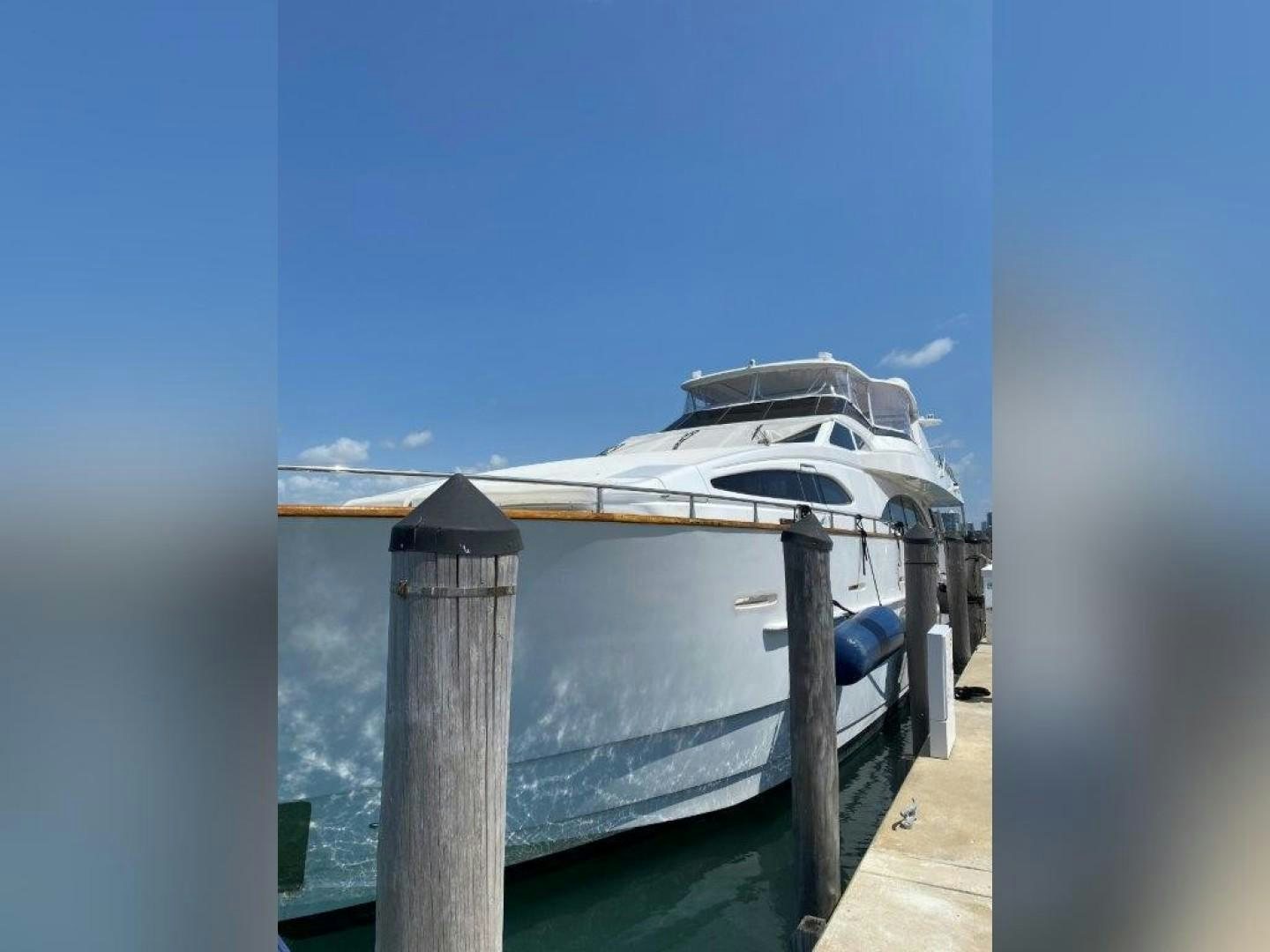 a boat docked at a pier aboard ISLAND SEEKER Yacht for Sale