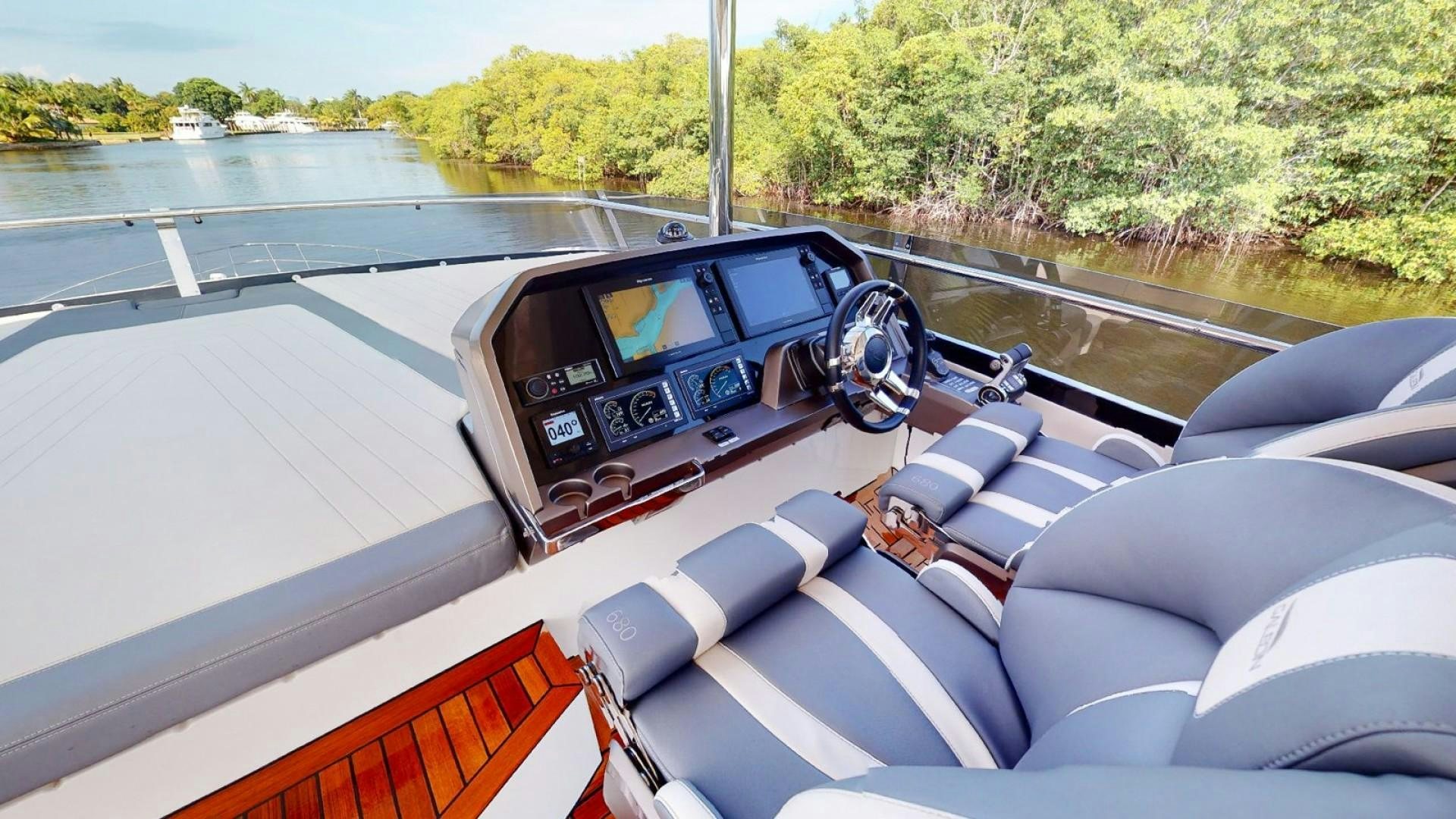 inside of a car aboard HANG TIME Yacht for Sale