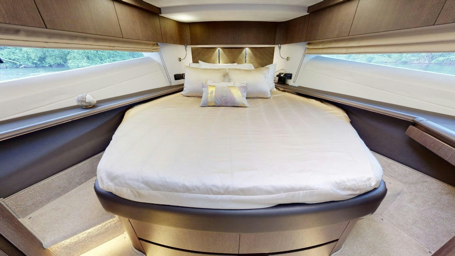 a bed in a room aboard HANG TIME Yacht for Sale