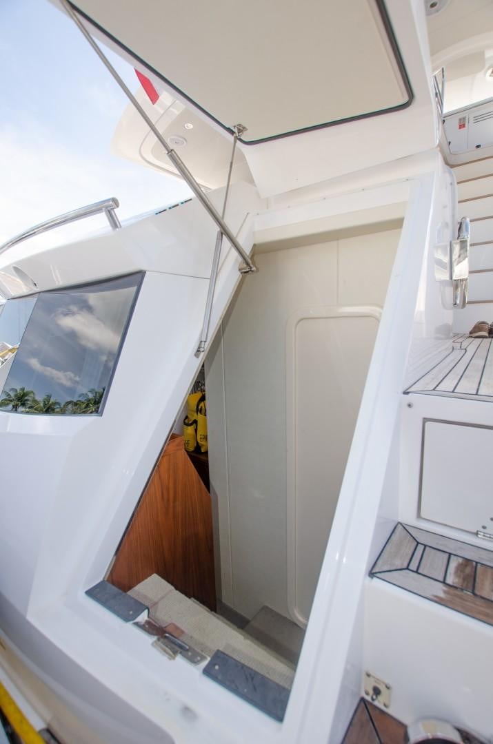 a white door with a white wall aboard No Name Yacht for Sale