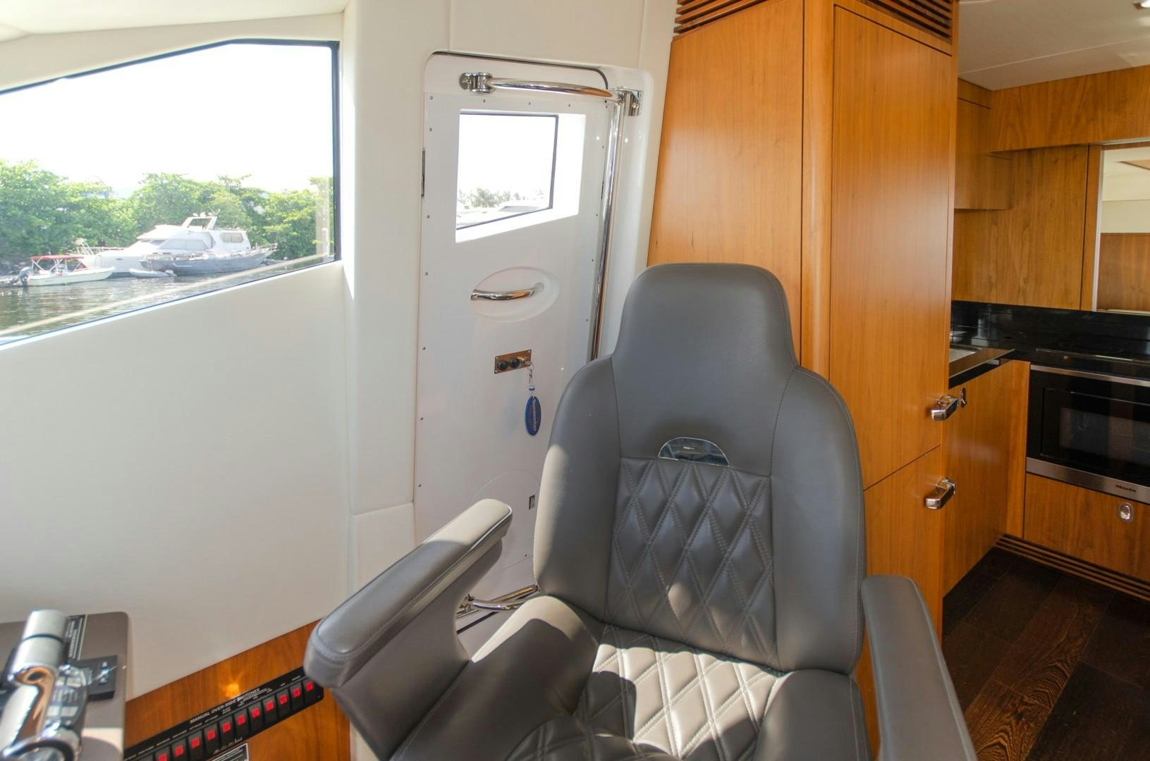 a chair in a room aboard No Name Yacht for Sale