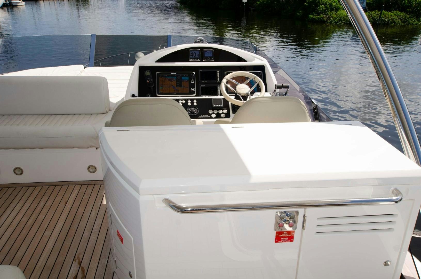 a person driving a car on a river aboard No Name Yacht for Sale