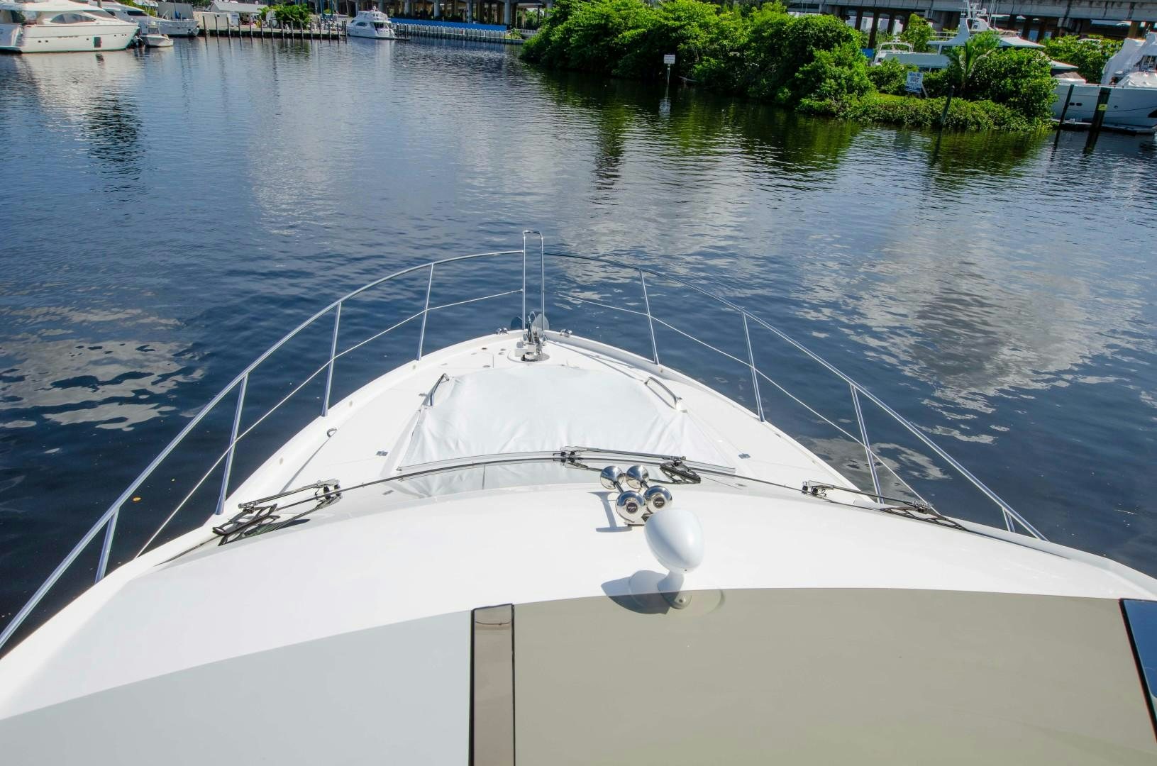 a white boat in the water aboard No Name Yacht for Sale