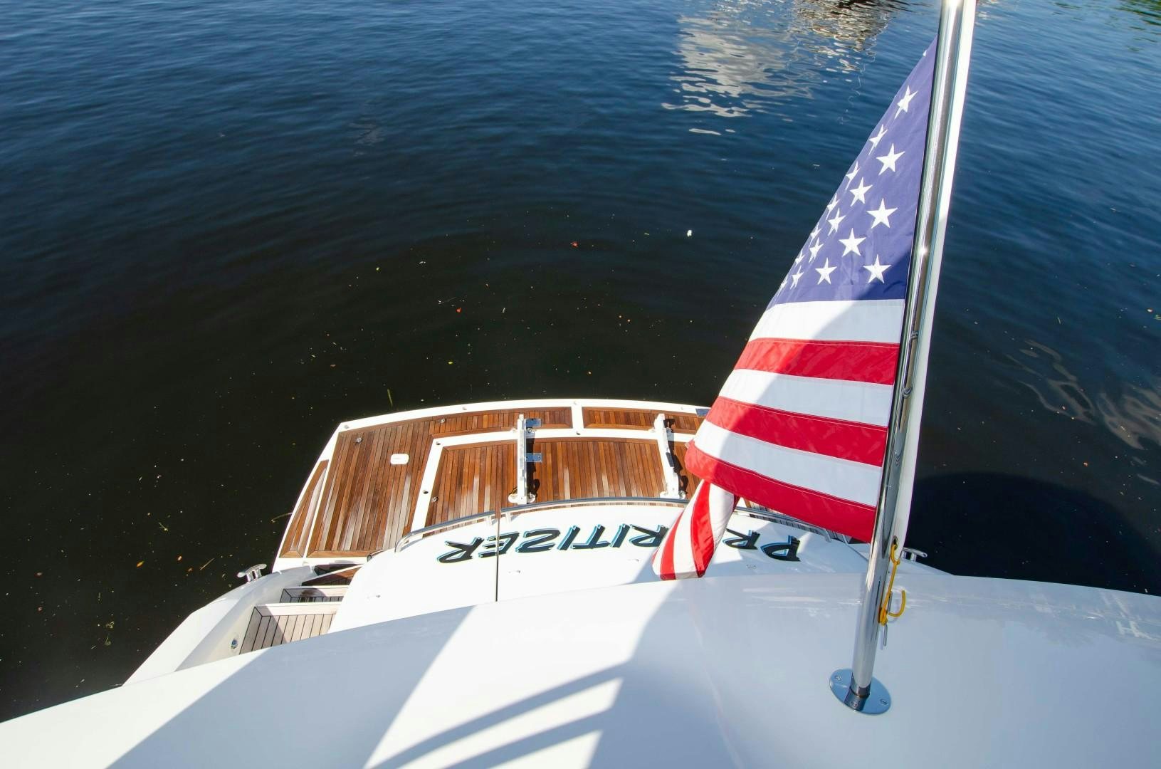 a flag on a boat aboard No Name Yacht for Sale