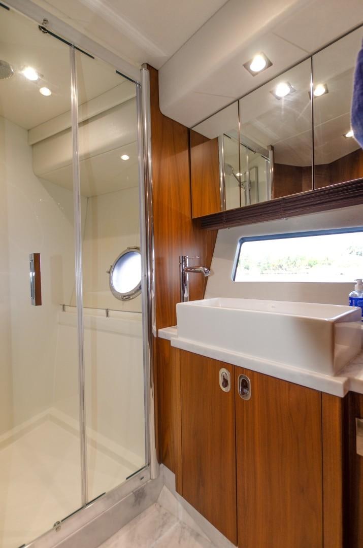 a bathroom with a sink and a mirror aboard No Name Yacht for Sale