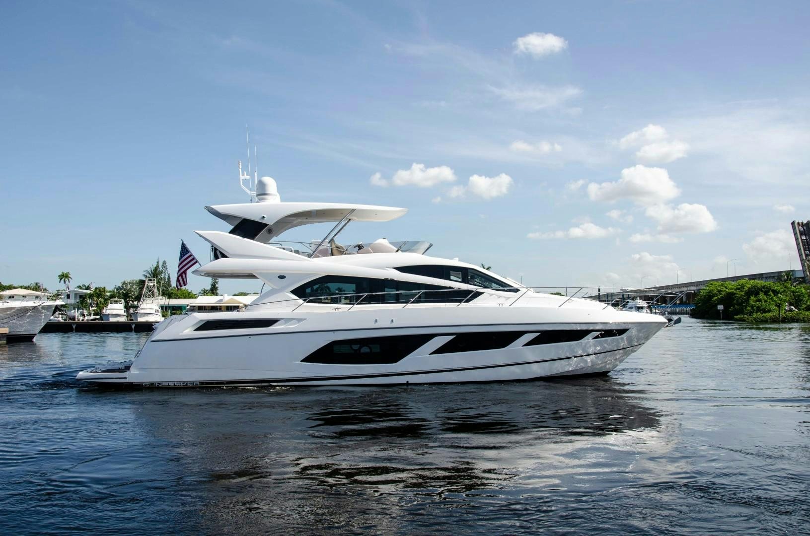 a white yacht in the water aboard No Name Yacht for Sale