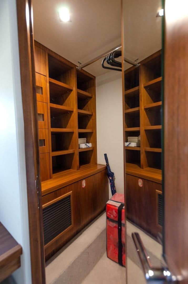 a closet with a shelf aboard No Name Yacht for Sale