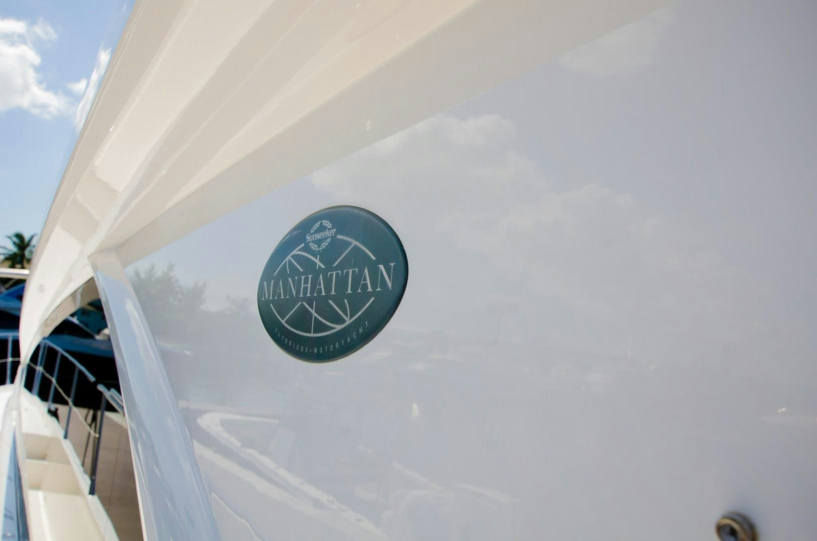 a white building with a logo aboard No Name Yacht for Sale