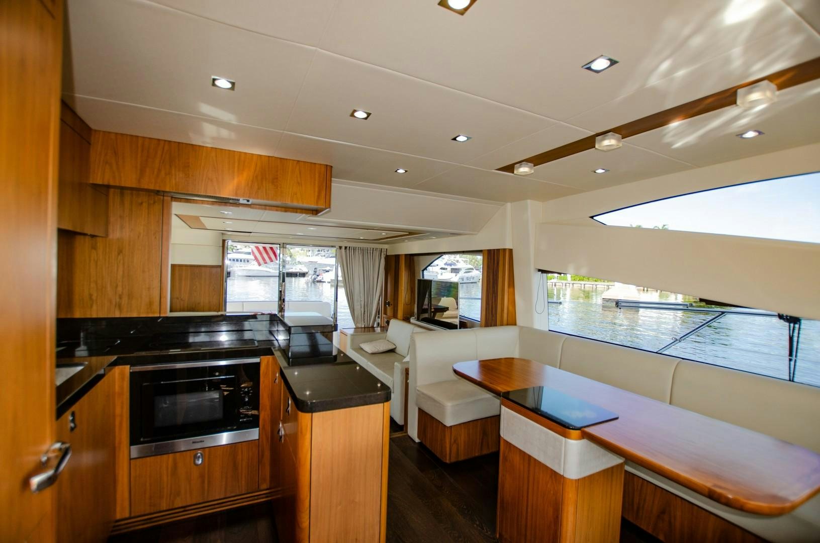 a kitchen with a large window aboard No Name Yacht for Sale