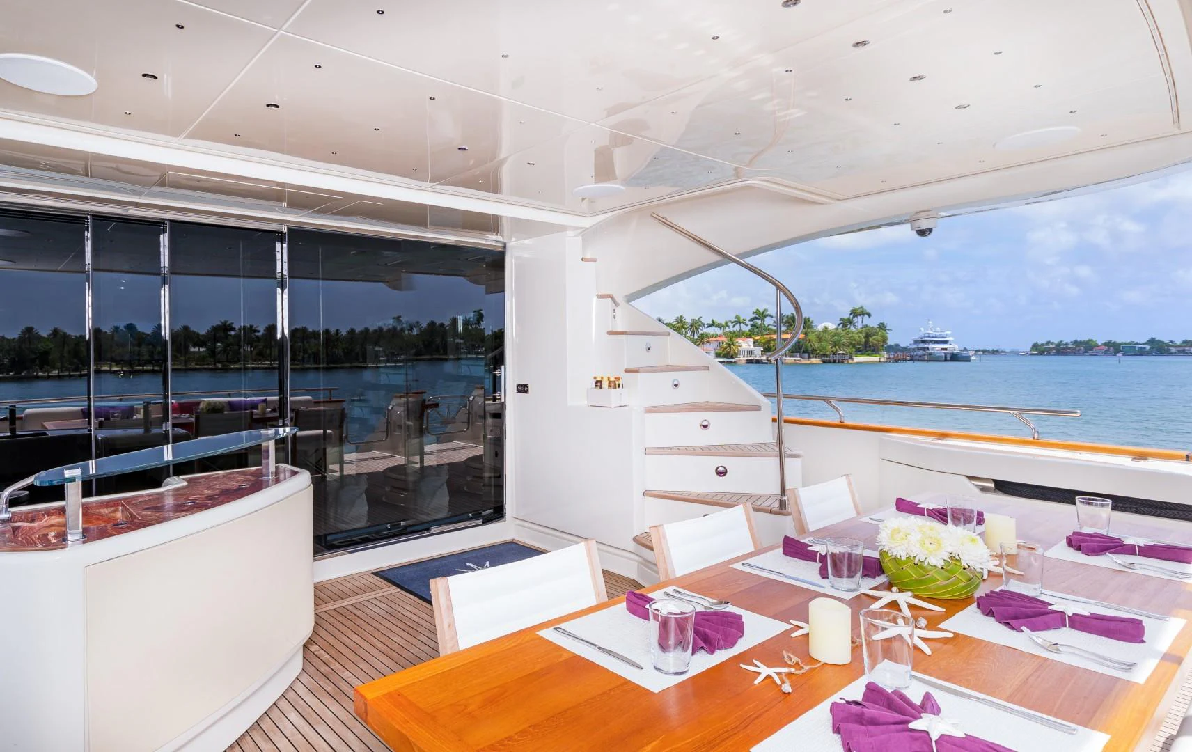 a room with a table and chairs aboard CASUAL Yacht for Sale