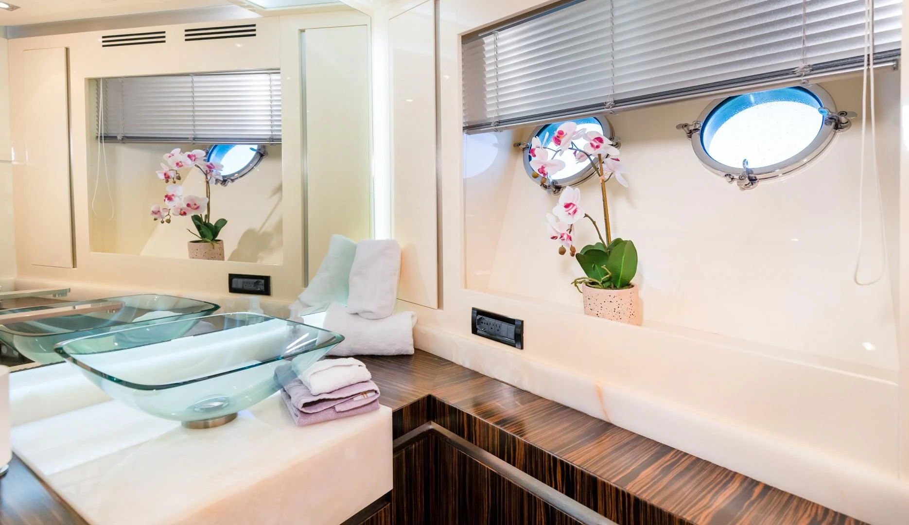 a bathroom with a tub sink and a mirror aboard CASUAL Yacht for Sale