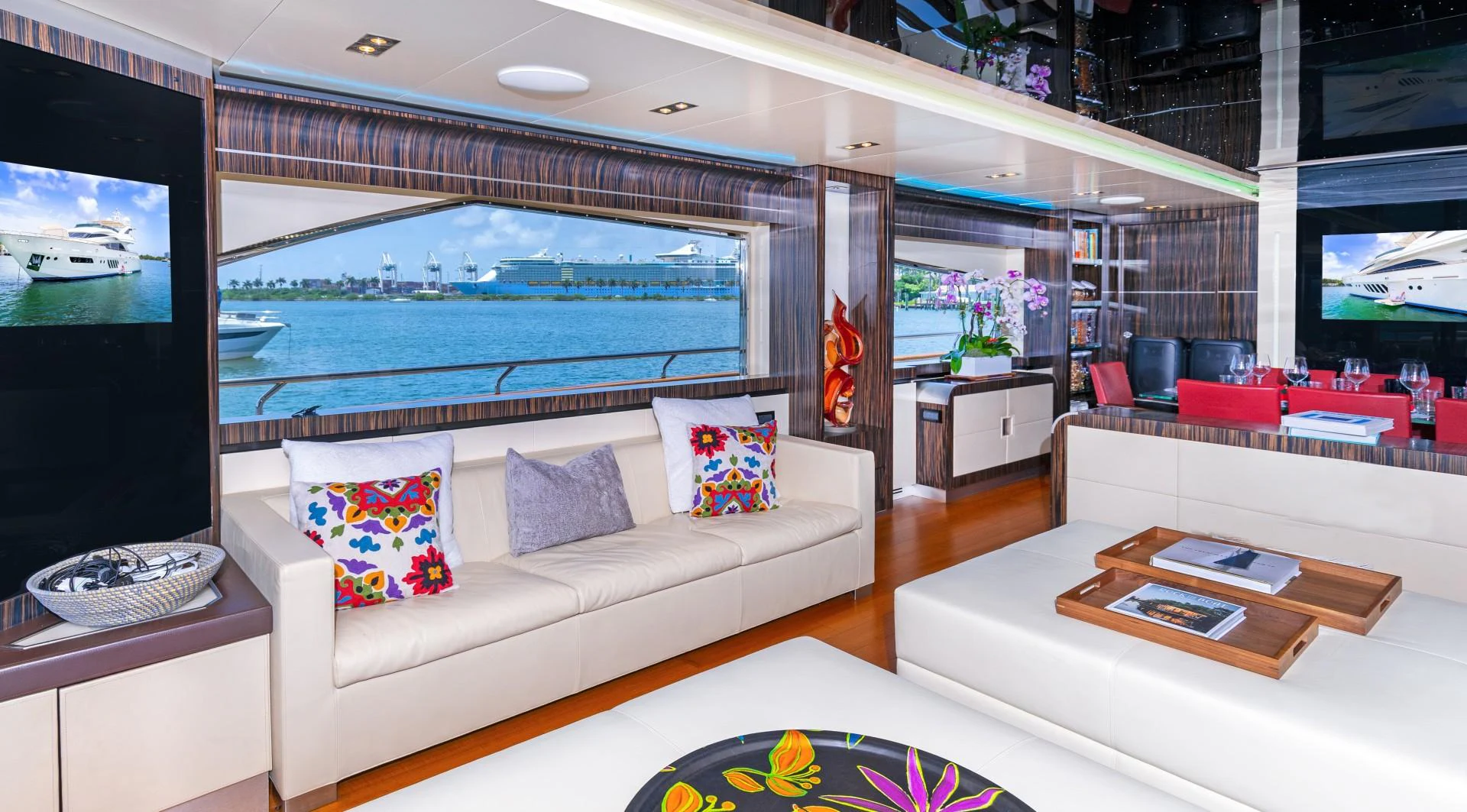 a living room with a large window aboard CASUAL Yacht for Sale