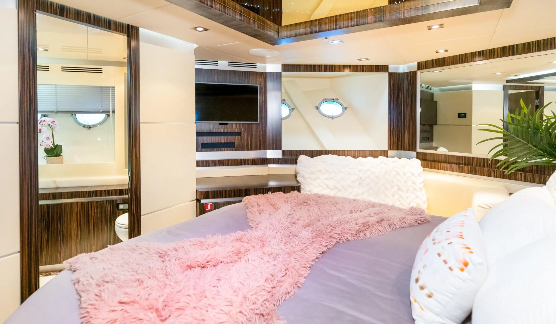 a bed in a room aboard CASUAL Yacht for Sale