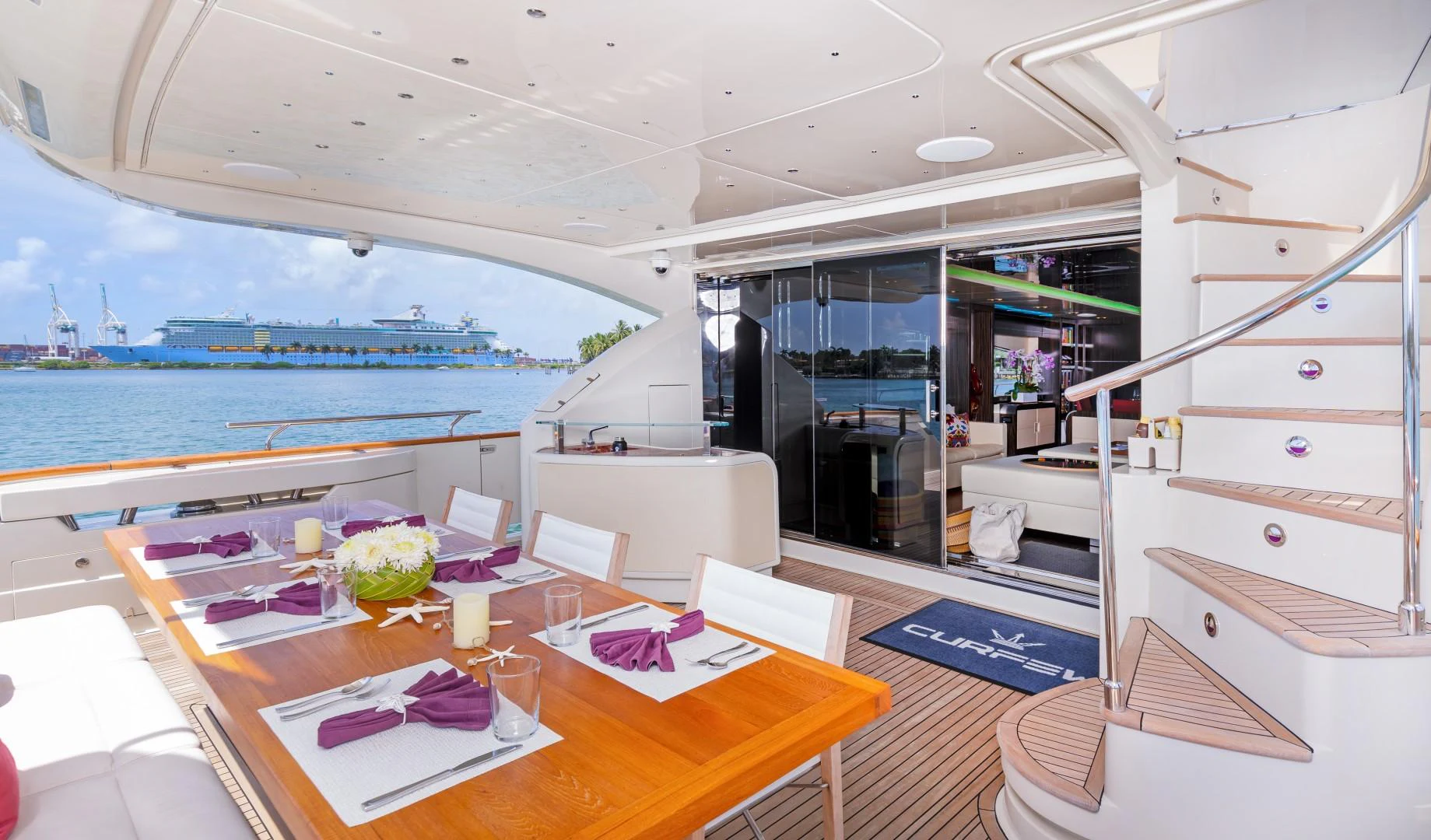 a room with a table and chairs aboard CASUAL Yacht for Sale