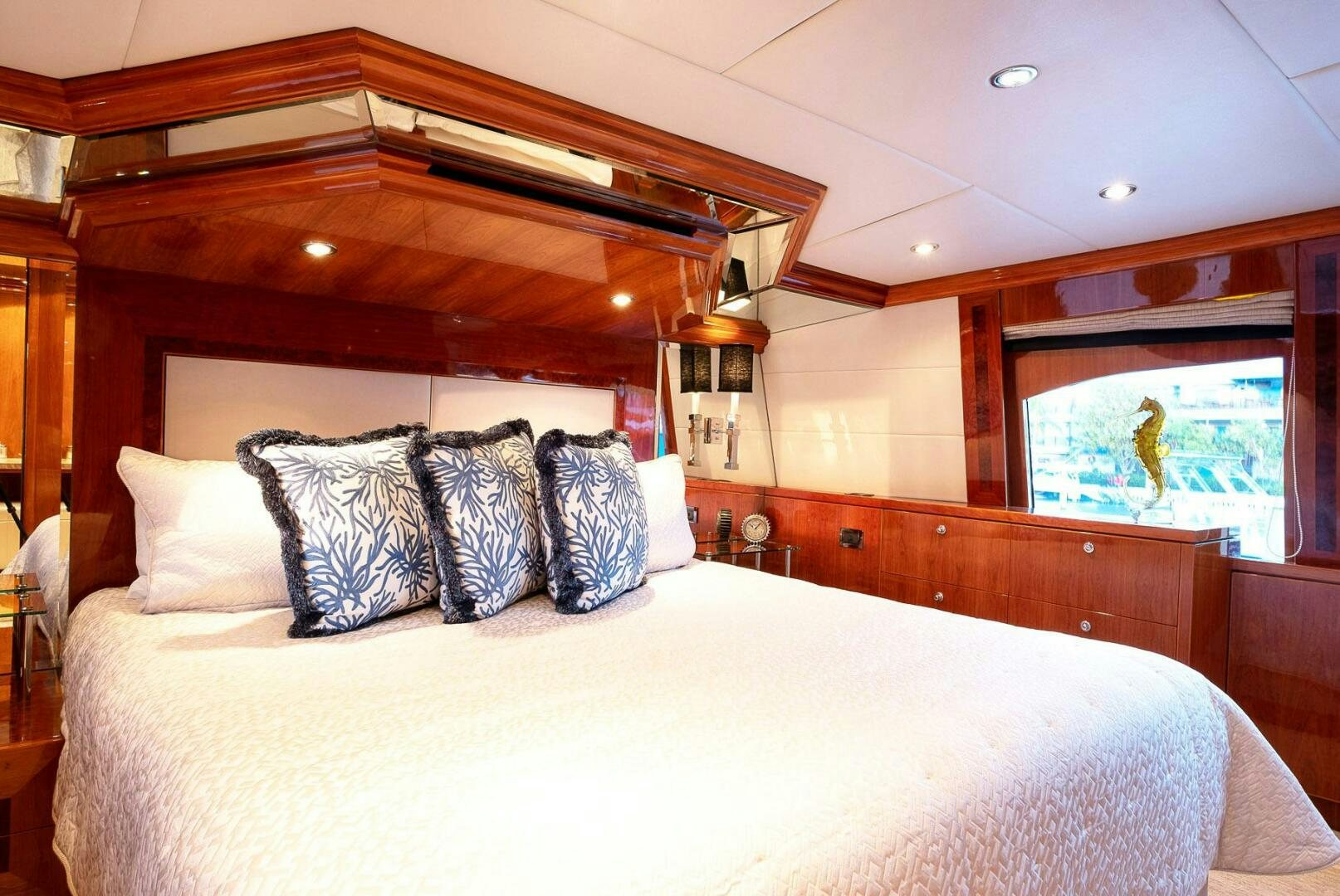 a bed with pillows aboard CYNDERELLA Yacht for Sale