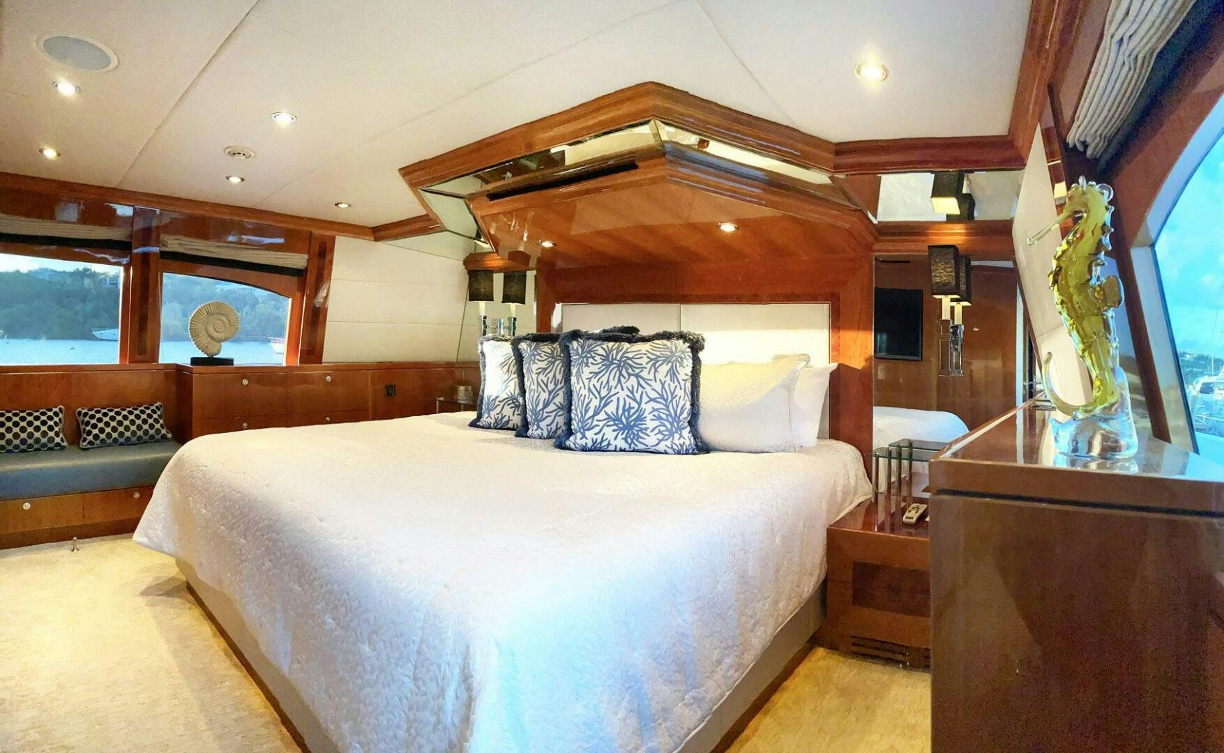 a large bed in a room aboard CYNDERELLA Yacht for Sale
