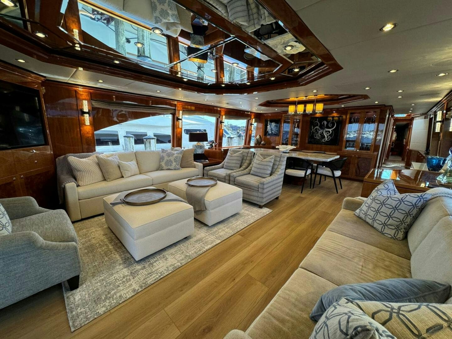 a living room with a large glass ceiling aboard CYNDERELLA Yacht for Sale