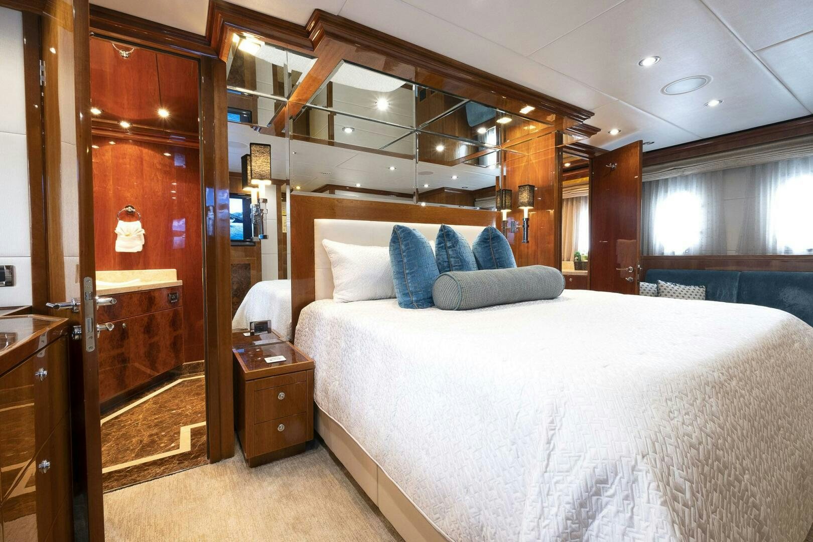 a bed in a room aboard CYNDERELLA Yacht for Sale