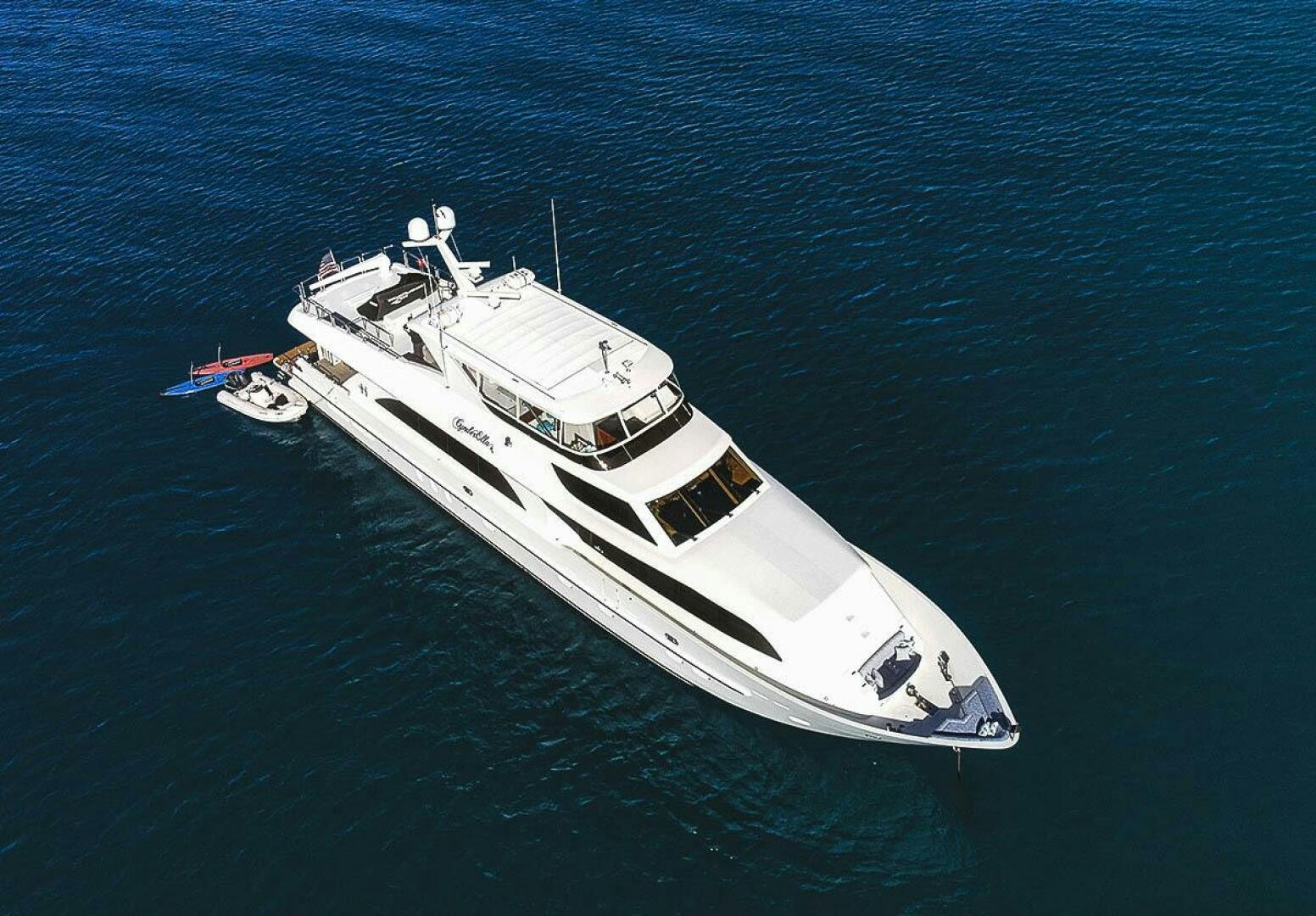 a white boat in the water aboard CYNDERELLA Yacht for Sale