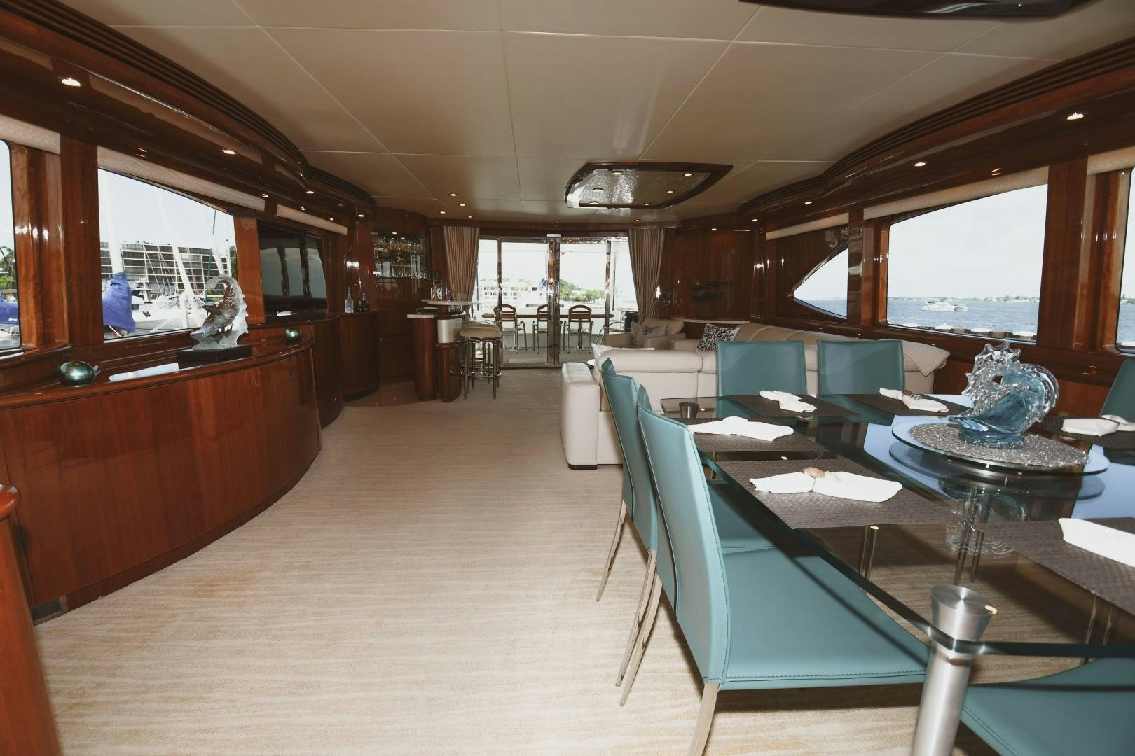 a room with a table and chairs aboard WARHORSE Yacht for Sale