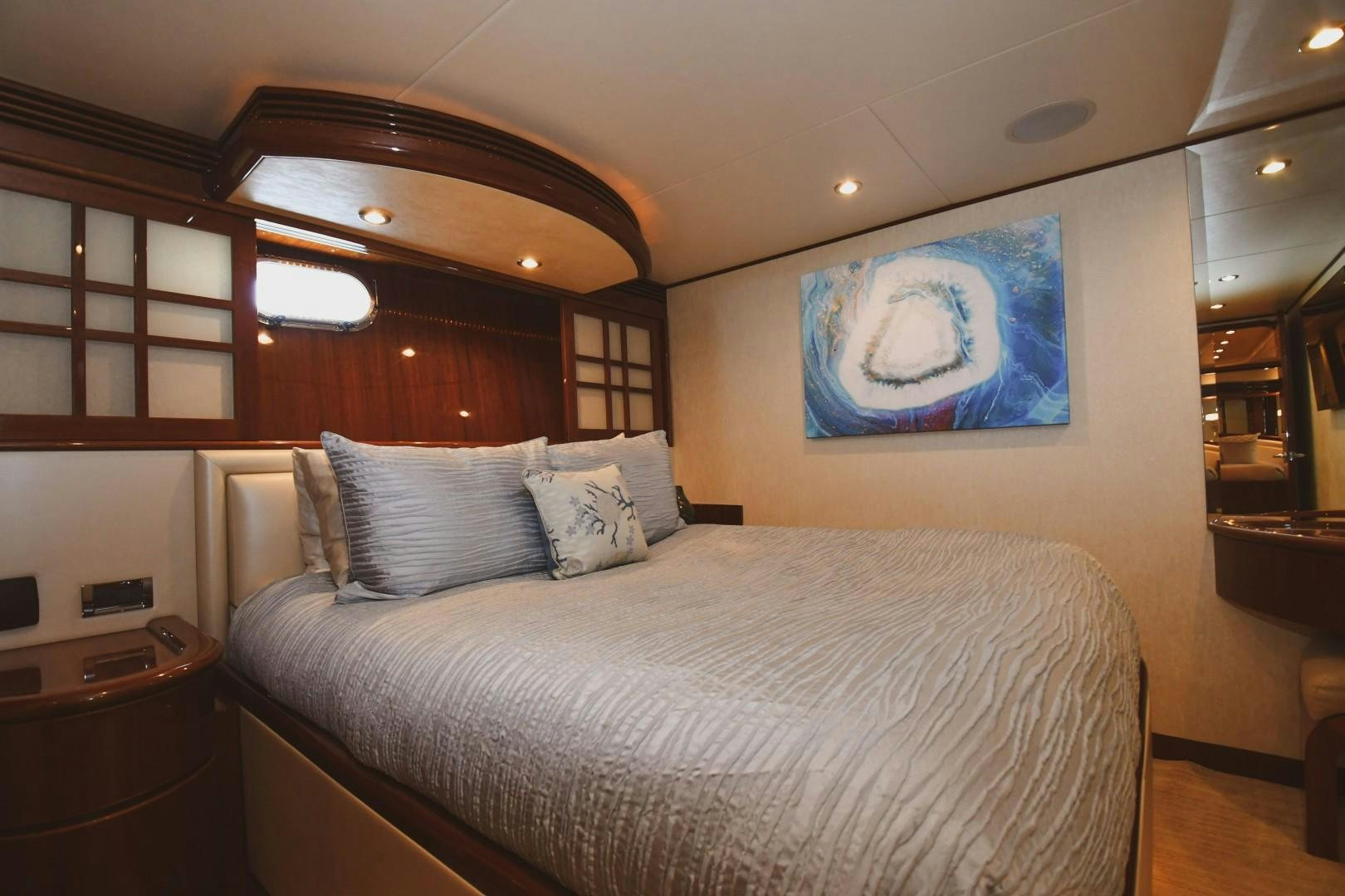 a bed with a white sheet aboard WARHORSE Yacht for Sale