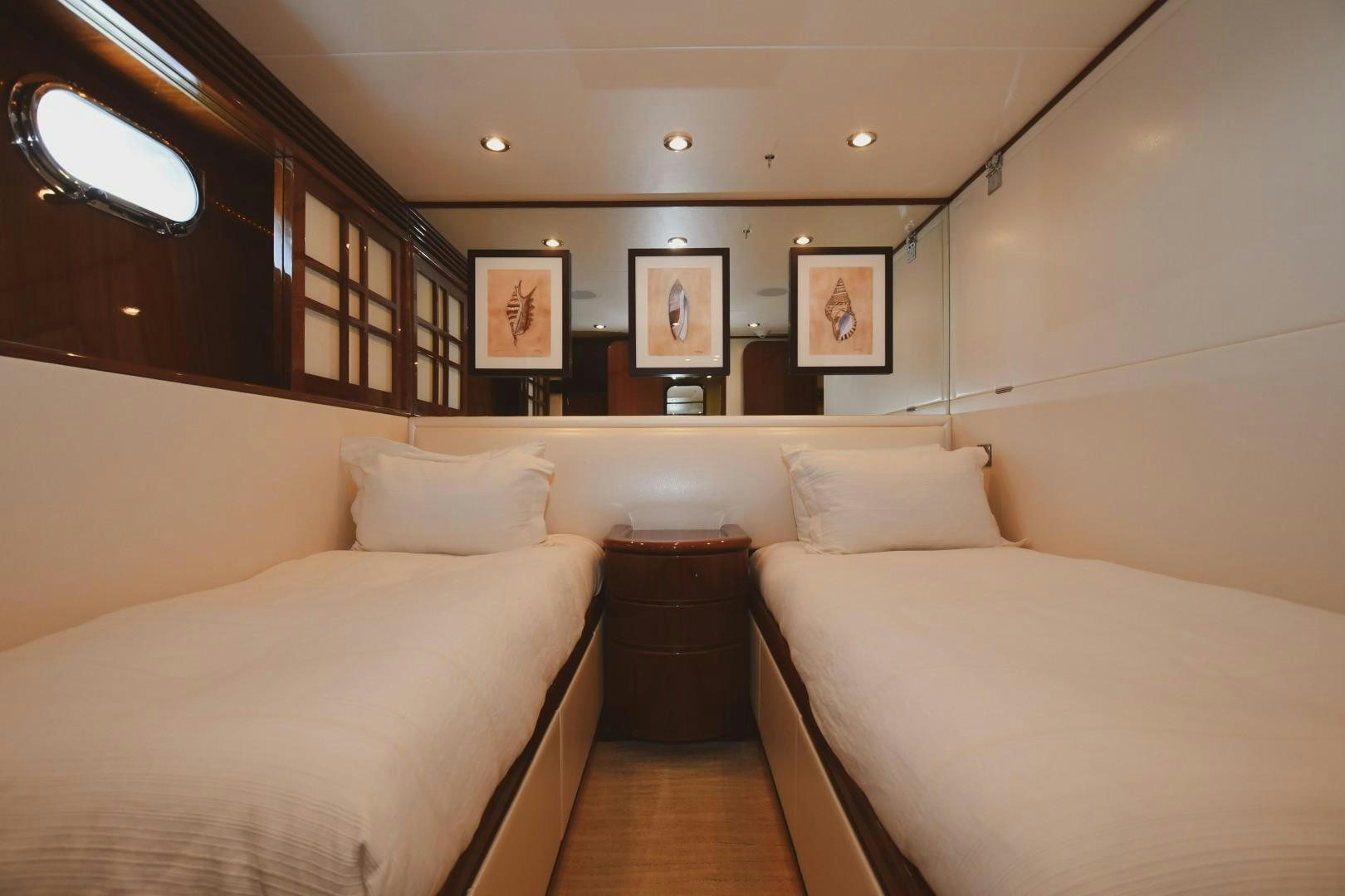 a room with a couple of beds aboard WARHORSE Yacht for Sale